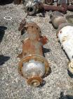 Used Doyle and Roth Shell and Tube Heat Exchanger, 99 square feet, vertical. Carbon steel shell rated 100 psi at 100 deg F, (254) 1/2