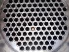 Used Doyle and Roth Shell and Tube Heat Exchanger, 247 square feet, horizontal. Hastelloy C276 tubes, tube sheets, heads and bonnets with (126) 3/4