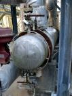 Used Doyle & Roth Shell & Tube Heat Exchanger, Approximate 169 Square Feet, Horizontal. Carbon steel shell rated 150 psi at -20 to 400 degrees F, (81) 1