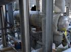 Used Doyle & Roth Shell & Tube Heat Exchanger, Approximate 169 Square Feet, Horizontal. Carbon steel shell rated 150 psi at -20 to 400 degrees F, (81) 1