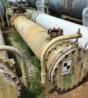 Used Doyle & Roth Shell & Tube Heat Exchanger, Horizontal. Approximate 1,115 Square Feet. Carbon steel shell rated 150 psi at -20 to 150 degrees F. (568) 304L Stainless steel 3/4