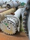 Used Doyle & Roth Shell & Tube Heat Exchanger, Horizontal. Approximate 1,115 Square Feet. Carbon steel shell rated 150 psi at -20 to 150 degrees F. (568) 304 Stainless steel 3/4
