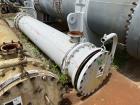 Used Doyle & Roth Shell & Tube Heat Exchanger, Horizontal. Approximate 1,115 Square Feet. Carbon steel shell rated 150 psi at -20 to 150 degrees F. (568) 304 Stainless steel 3/4