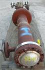 USED: Doyle and Roth multi-pass shell and tube heat exchanger, 18.8 square feet, vertical. Carbon steel shell with expansion ring rated 150 psi at 600 deg F. (16) 3/4