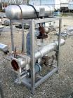 USED:Enfab 4 pass shell and tube heat exchanger, 12 sq ft, modelSA4C4, 316 stainless steel, horizontal. 316 stainless steel shellrated 150 psi at 350 deg F. Stainless steel head. (14) 3/4