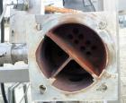USED:Enfab 4 pass shell and tube heat exchanger, 12 sq ft, modelSA4C4, 316 stainless steel, horizontal. 316 stainless steel shellrated 150 psi at 350 deg F. Stainless steel head. (14) 3/4