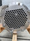 Unused- Enerquip Shell & Tube Heat Exchanger, Stainless Steel, Vertical. Approximate 132 square feet. 304L Stainless steel shell rated 150 psi at -20 to 375 degrees F. (126) 316L Stainless steel stra...