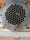 Used Enerquip Shell & Tube Heat Exchanger, 304L Stainless Steel, Vertical. Approximate 89 square feet. 304L Stainless steel shell rated 150 psi at -20 to 375 degrees F. (85) 316L Stainless steel stra...