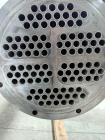 Used Enerquip Shell & Tube Heat Exchanger, Stainless Steel, Vertical. Approximate 109 square feet. 304L Stainless steel shell rated 150 psi at -20 to 375 degrees F. (104) 316L Stainless steel straigh...