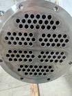 Used Enerquip Shell & Tube Heat Exchanger, Stainless Steel, Vertical. Approximate 109 square feet. 304L Stainless steel shell rated 150 psi at -20 to 375 degrees F. (104) 316L Stainless steel straigh...
