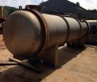 Used Gaston County Dyeing Machine Multiple Pass Shell and Tube Heat Exchanger. Approximate 4550 square feet, horizontal. 304L stainless steel shell rated 25psi/full vacuum at -20 to 250 degrees F. (1...