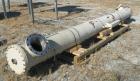 USED: Graham single pass shell and tube heat exchanger, 611 square feet, vertical. Carbon steel shell rated FV/20 psi at 150 deg F, (208) 3/4