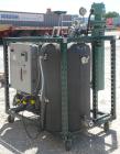 Used- Stainless Steel Graham Heliflow Heat Exchanger, model 30GC6C-16L, approximately 30 square feet