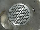 Used Graham single pass shell and tube heat exchanger, 107 square feet, horizontal. Carbon steel shell rated 75 psi at 300 deg.f., (117) 5/8