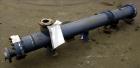 Used ITT Industries Shell & Tube Heat Exchanger, Approximate 124 Square Feet, Horizontal. Carbon steel shell rated 100 psi at -20 to 375 degrees F. (200) 3/8