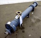 Used ITT Industries Shell & Tube Heat Exchanger, Approximate 124 Square Feet, Horizontal. Carbon steel shell rated 100 psi at -20 to 375 degrees F. (200) 3/8
