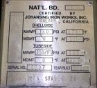Used Johansing Iron Works Shell & Tube Heat Exchanger, Approximately 78 Square Feet, Vertical. Carbon steel shell rated 150 psi at 170 degrees F. (51) 316L Stainless steel 3/4