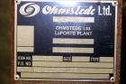 Used Johansing Iron Works Shell & Tube Heat Exchanger, Approximately 37 Square Feet, Vertical. Carbon steel shell rated 150 psi at 170 degrees F. (24) 316L Stainless steel 3/4