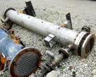 USED: Ketema U-tube shell and tube heat exchanger, 80 square feet, size 12-B-84, horizontal. 316L stainless steel shell rated 150 psi at 450 deg F, (56) 3/4