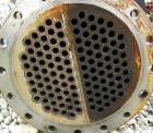 USED: Ketema U-tube shell and tube heat exchanger, 80 square feet, size 12-B-84, horizontal. 316L stainless steel shell rated 150 psi at 450 deg F, (56) 3/4