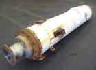 Used Mason Single Pass Shell & Tube Heat Exchanger, 448 Square Feet, Vertical. Carbon steel shell rated 100psi at -20 to 200 degrees F., (305) 5/8