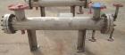 Unused- Mueller 4 Pass Shell And Tube Heat Exchanger, 9 square feet, Horizontal. Tema Type BEM, Tema Size 6-48, Tema Class C. 304 stainless steel shell rated 150 psi at 400 deg.f., and -20 deg.f. at ...
