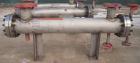 Unused- Mueller 4 Pass Shell And Tube Heat Exchanger, 9 square feet, Horizontal. Tema Type BEM, Tema Size 6-48, Tema Class C. 304 stainless steel shell rated 150 psi at 400 deg.f., and -20 deg.f. at ...