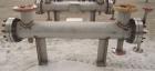 Unused- Mueller 4 Pass Shell and Tube Heat Exchanger, 9 Square Feet, Horizontal. STI Tema Type BEM, Tema Size 6-48, Tema Class C. 304 stainless steel shell rated 150 psi at 400 deg F and -20 deg F at...