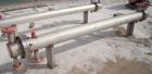 Unused- Mueller Single Pass Shell and Tube Heat Exchanger, 42 square feet, horizontal. Tema Type BEM, Tema Size 6-96, Tema Class C. 304 stainless steel shell rated 150 psi at 200 deg F and -20 deg F ...