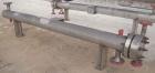 Unused- Mueller 4 Pass U Tube Shell And Tube Heat Exchanger, 25 square feet, Horizontal. Tema Type BEU, Tema Size 6-96, Tema Class C. 304 stainless steel shell rated 150 psi at 600 deg.f., and -20 de...