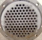 Used Mueller Shell and Tube Heat Exchanger, 235 square feet, horizontal. Carbon steel shell rated 150 psi at 200 deg   F and -20 deg F at 150 psi. (109) 3/4