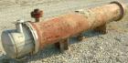 Used Ludell Manufacturing 6 pass shell and tube heat exchanger, model 18-108-6. Approximately 264 square feet, horizontal. Carbon steel shell rated 200 psi at 400 deg F, (150) 3/4'' diameter x 9' lon...