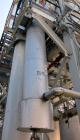 Used Enerquip Shell & Tube Heat Exchanger, Approximately 307.7 Square Feet, Vertical. Type BEM-16-120. Carbon steel shell rated 150 psi & Full Vacuum at 365 degrees F. (157) 3/4