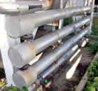 Used Enerquip Shell & Tube Heat Exchanger, Approximately 39.9 Square Feet, Stainless Steel, Horizontal. Type BEM-3-120. 304L Stainless steel shell rated 150 psi & Full Vacuum at 300 degrees F. (61) 1...