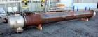 Used Perry Products Multiple Pass Shell & Tube Heat Exchanger, 1905 Square Feet, Horizontal. Carbon steel shell rated 150 psi at 20 to 370 degrees F. (486) 3/4