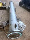 Used Perry Products 225 sq. ft. Vertical Shell and Tube Heat Exchanger. 304L Stainless steel tubes rated 75 psi at 0 to 320 degrees F, 11' Tube length, 104 tube holes. 1' Shell diameter. Stainless st...