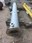 Used Perry Products 225 sq. ft. Vertical Shell and Tube Heat Exchanger. 304L Stainless steel tubes rated 75 psi at 0 to 320 degrees F, 11' Tube length, 104 tube holes. 1' Shell diameter. Stainless st...