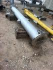 Used Perry Products 225 sq. ft. Vertical Shell and Tube Heat Exchanger. 304L Stainless steel tubes rated 75 psi at 0 to 320 degrees F, 11' Tube length, 104 tube holes. 1' Shell diameter. Stainless st...