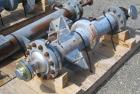 Used Pfaudler Single Pass Shell & Tube Heat Exchanger, 15.2 square feet, vertical. Carbon steel shell rated 100 psi at -20 to 400 deg F. (26) 3/4