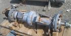 Used Pfaudler Single Pass Shell & Tube Heat Exchanger, 15.2 square feet, vertical. Carbon steel shell rated 100 psi at -20 to 400 deg F. (26) 3/4