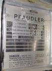 Used Pfaudler Single Pass Shell & Tube Heat Exchanger, 15.2 square feet, vertical. Carbon steel shell rated 100 psi at -20 to 400 deg F. (26) 3/4