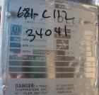 Used Pfaudler Single Pass Shell & Tube Heat Exchanger, 15.2 square feet, vertical. Carbon steel shell rated 100 psi at -20 to 400 deg F. (26) 3/4