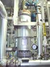 Used Pfaudler Single Pass Shell & Tube Heat Exchanger, 29.9 square feet, vertical. Carbon steel shell rated 100 psi at -20 to 400 deg F. (51) 3/4