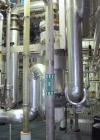 Used Pfaudler Single Pass Shell & Tube Heat Exchanger, 29.9 square feet, vertical. Carbon steel shell rated 100 psi at -20 to 400 deg F. (51) 3/4