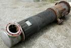 USED: Roben single pass shell and tube heat exchanger, 200 square feet, vertical. Carbon steel shell rated 100 psi at 212 deg F, (204) 3/4