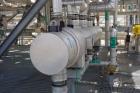 Unused- SteelTek Shell and Tube Heat Exchanger, 157 Square Foot, Horizontal. 304L Stainless steel shell rated 351 psi at -55 to 400 degrees F. (75) 3/4