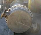 USED: Wayron Inc multi pass shell and tube heat exchanger, 706 square feet, horizontal. Carbon steel shell with expansion ring rated 150 psi at 370 deg F. (180) 1-1/4