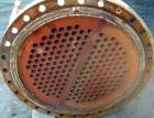 USED: Wayron Inc multi pass shell and tube heat exchanger, 706 square feet, horizontal. Carbon steel shell with expansion ring rated 150 psi at 370 deg F. (180) 1-1/4