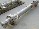 USED: Weldon single pass shell and tube heat exchanger, 18.8 square feet, vertical. 316 stainless steel shell rated 200 psi at 500 deg F. (16) 3/4