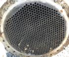 Used Wolfe Mechanical and Equipment Single Pass Shell and Tube Heat Exchanger, 1285 square feet, vertical. 304 Stainless steel shell rated 100 psi at 300 degrees F. (656) 3/4